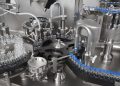 automatic machine for filling and closing bottles. Bausch+Ströbel
