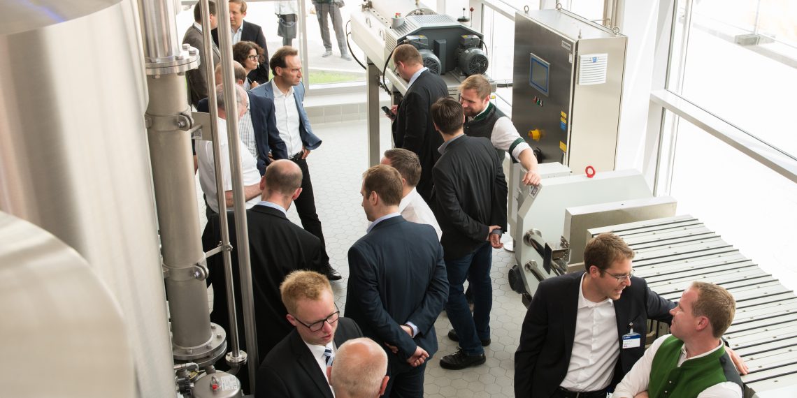 Numerous guests had their first view of the brewing pilot plant at the inauguration ceremony. Picture: Krones
