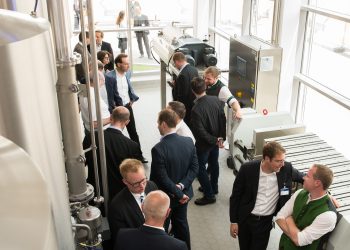 Numerous guests had their first view of the brewing pilot plant at the inauguration ceremony. Picture: Krones